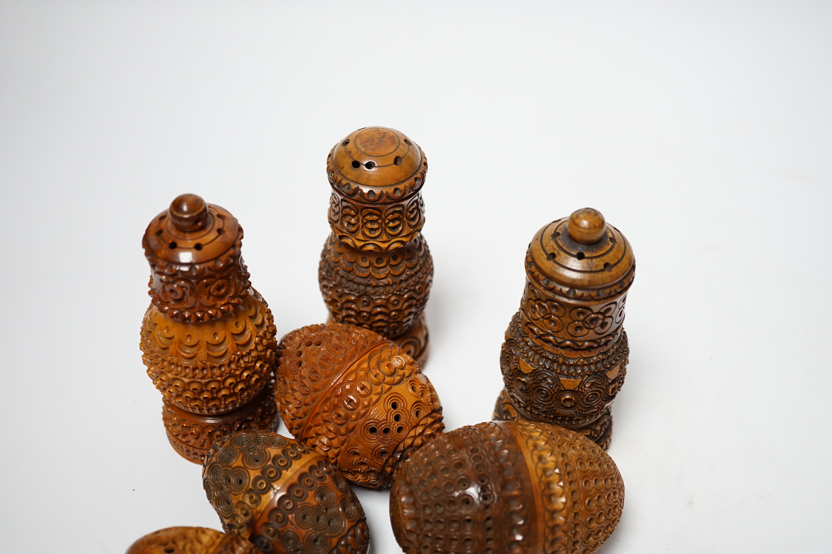 A quantity of coquilla nut carvings (8)
